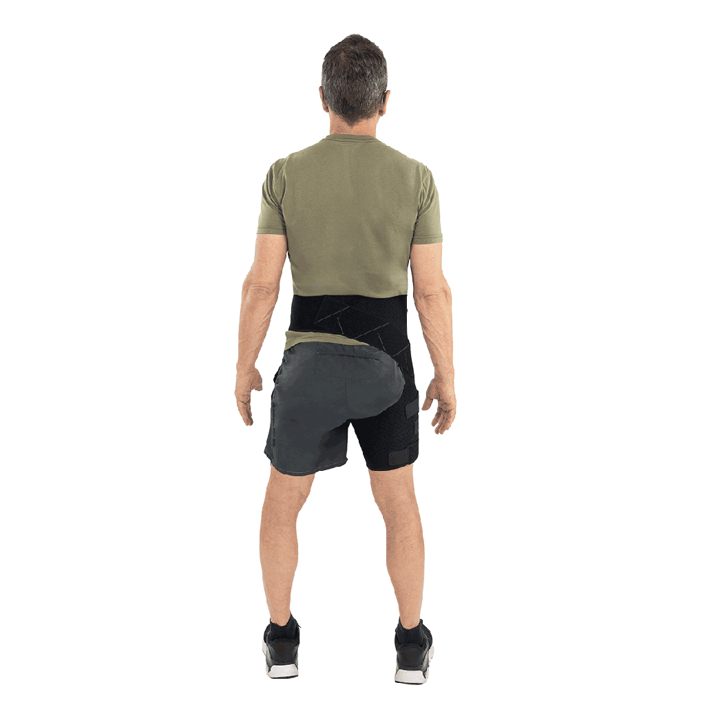 Man wearing a green t-shirt and black shorts on a white background