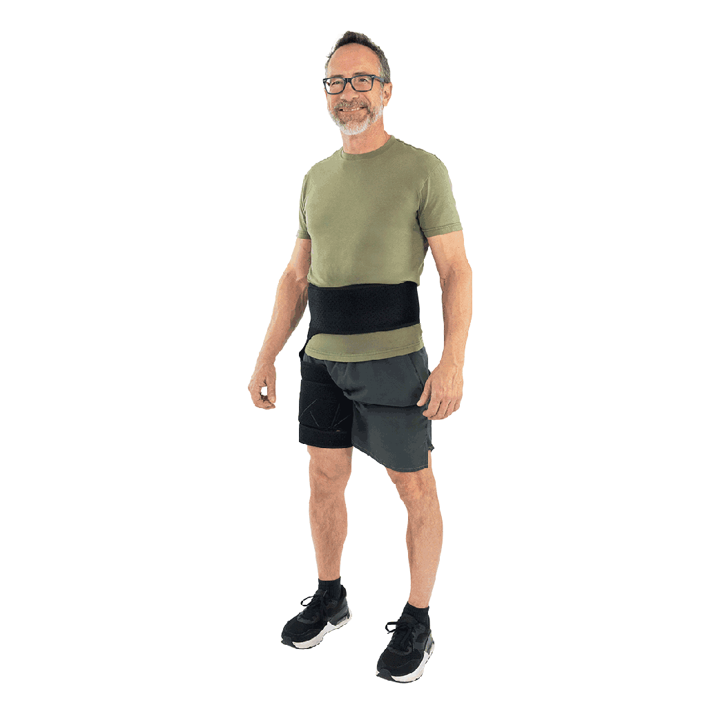 Man wearing a green t-shirt and black shorts on a white background