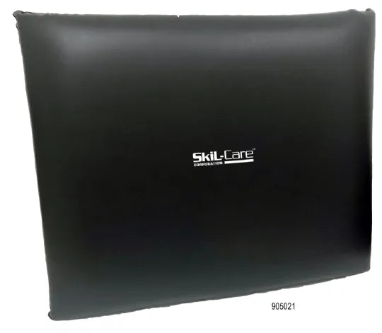 Black cushion with 'Skil-Care' logo on a white background