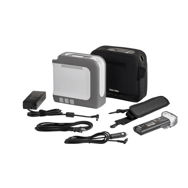 Collection of electronic devices and accessories on a white background