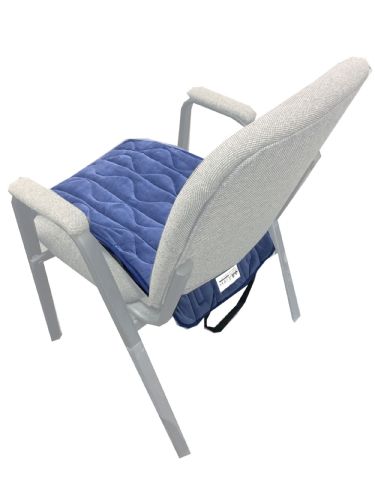 Blue chair pad on a white chair with a white background