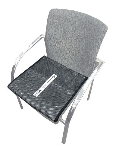 Black mesh chair pad on a gray chair with a white background