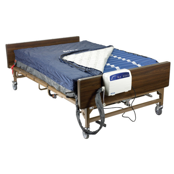 Hospital bed with air mattress and control panel on a white background