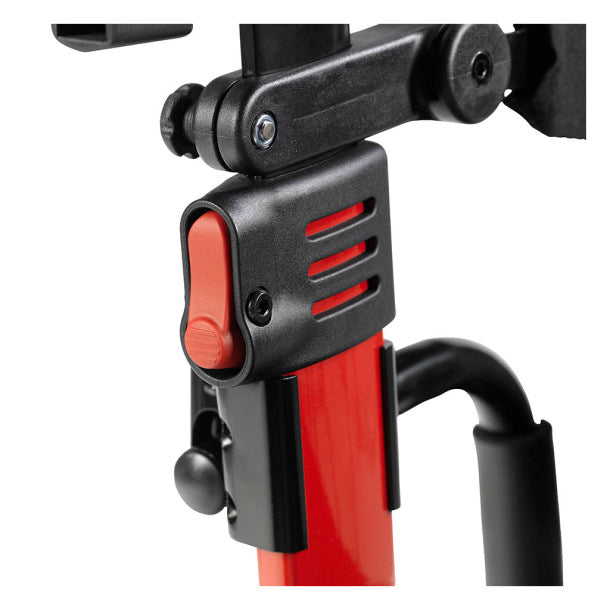 Close-up of a red and black bicycle frame with a detailed view of the components.