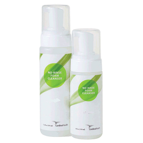 Two bottles of no-rinse foam cleanser with green labels on a white background