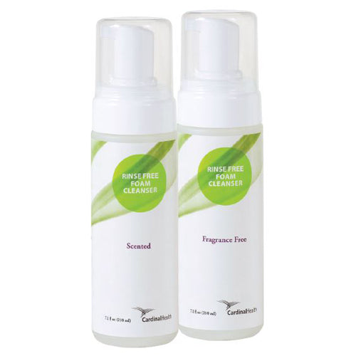 Two bottles of rinse-free foam cleanser with green labels on a white background