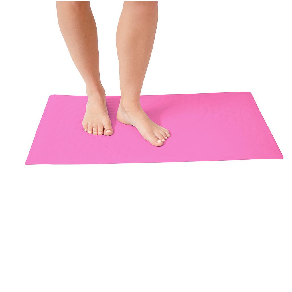 Person standing on a bath mat with a white background