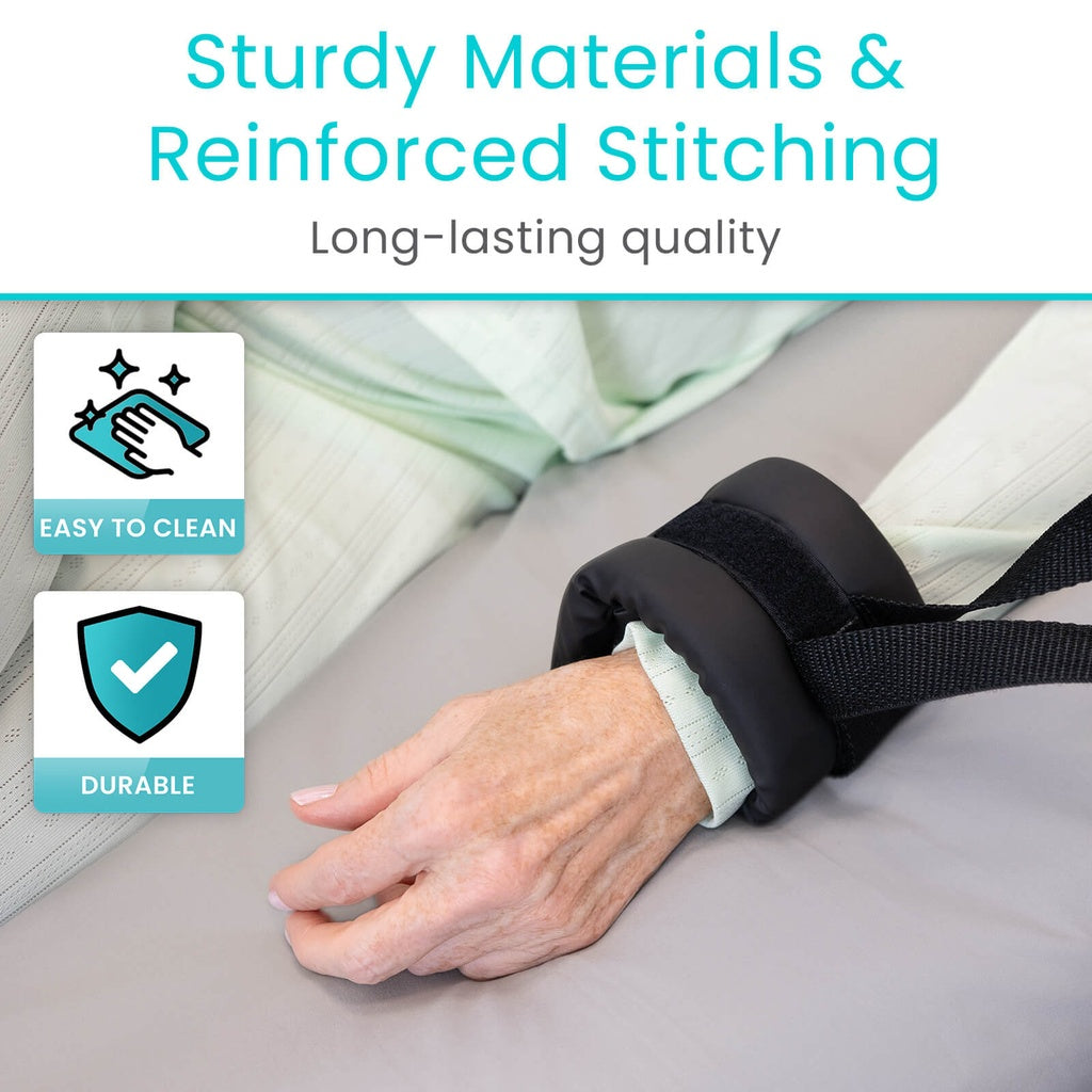 Hand wearing a black wrist support with text about material quality and ease of cleaning.