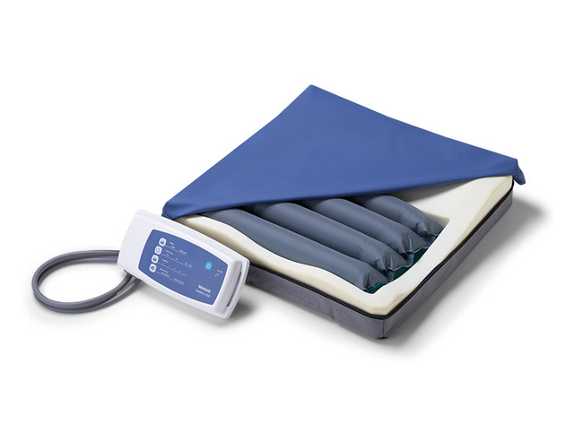 Inflatable mattress with blue cover and digital controller on a white background