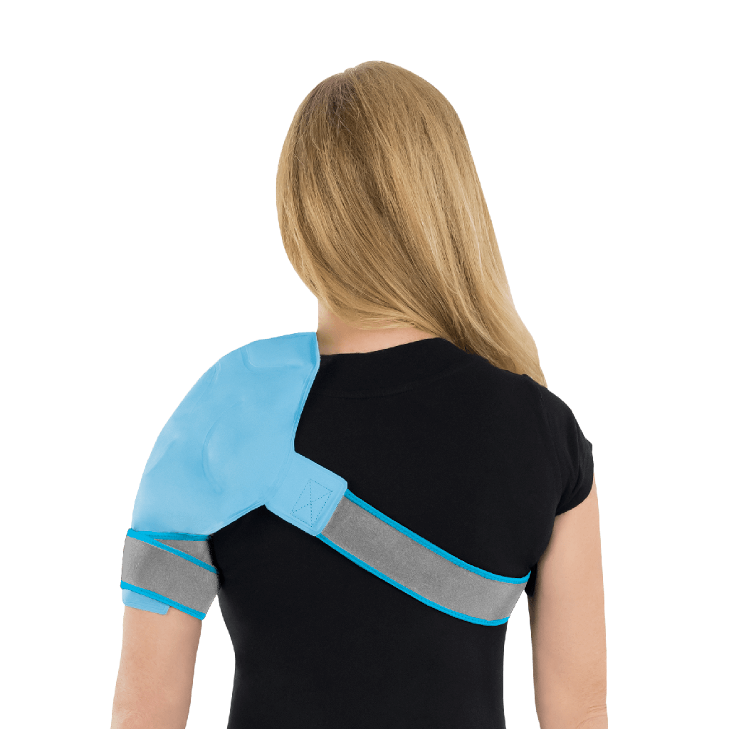 Person wearing a blue and gray shoulder brace on a black background