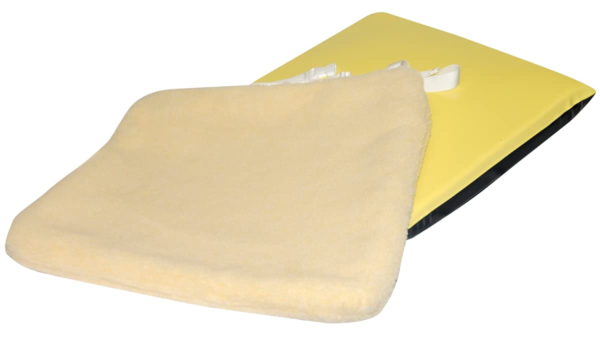 Yellow and beige cushion on a white background