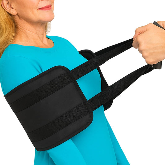 Woman wearing a black shoulder brace against a white background