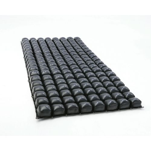 Black rubber mat with diamond pattern on a white background
