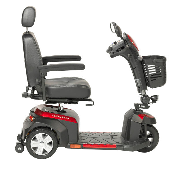 Gray and black mobility scooter with a basket on a white background