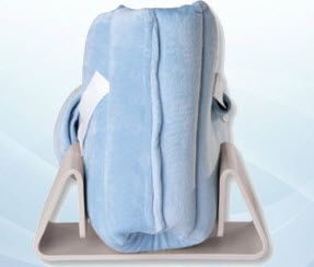 Baby seat with a blue cushion on a white background
