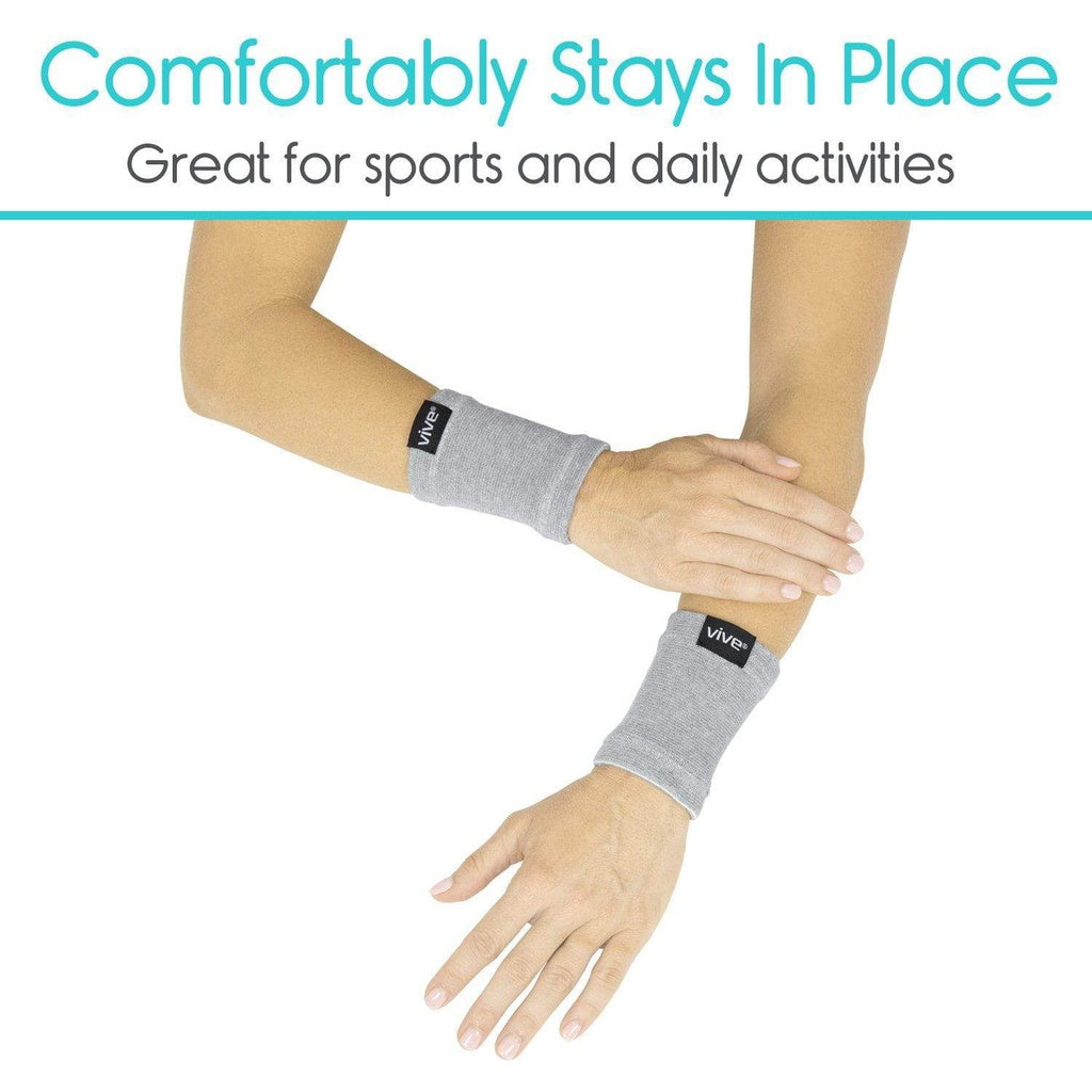 Gray wrist support brace worn by a person on a white background with text about comfort and use.