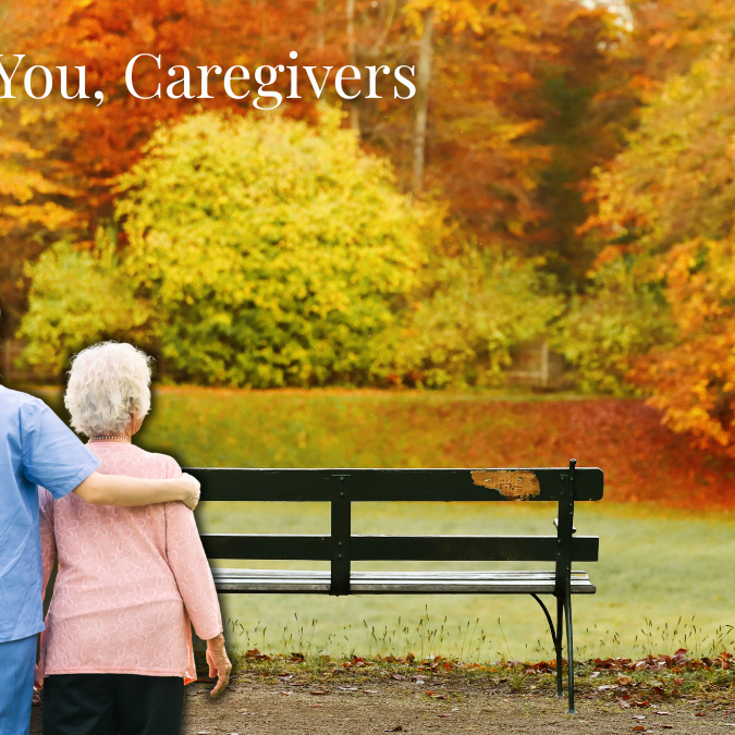 A caregiver with her senior client enjoying a fall day togehter.