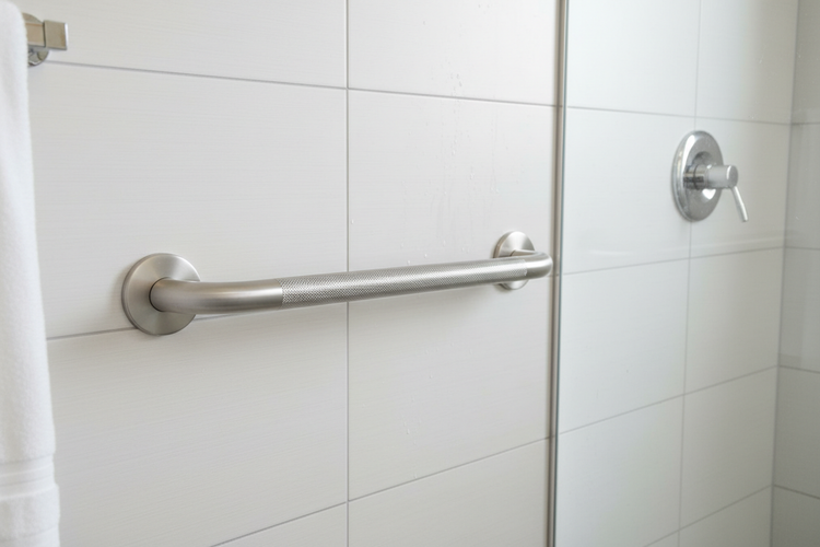 Shower with a safety grab bar