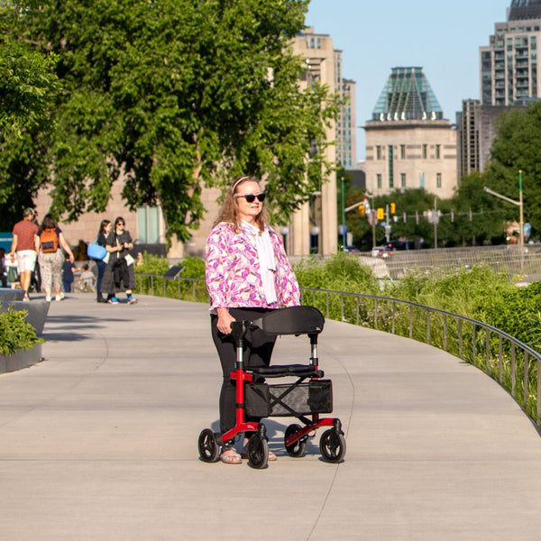 4-wheel rollator walker with padded seat, storage pouch, and hand brakes