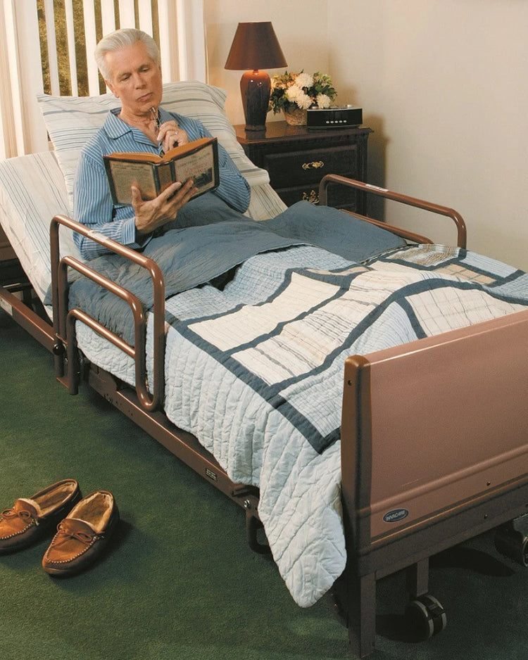 elderly man laying in home hospital bed