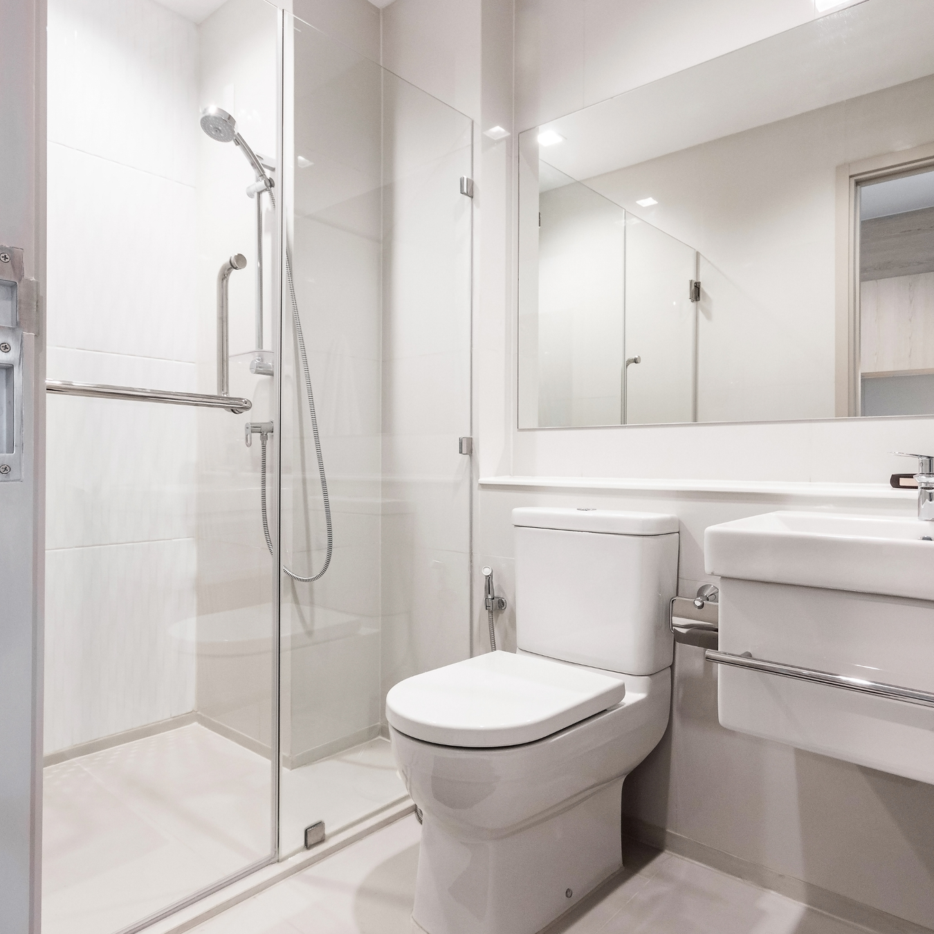 woman exiting shower using grab bar