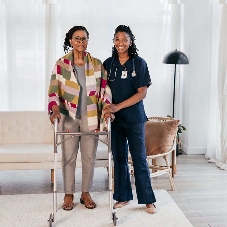 woman standing with caregiver