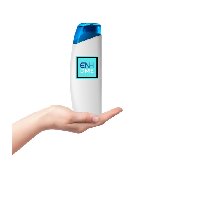 bottle of shampoo being held