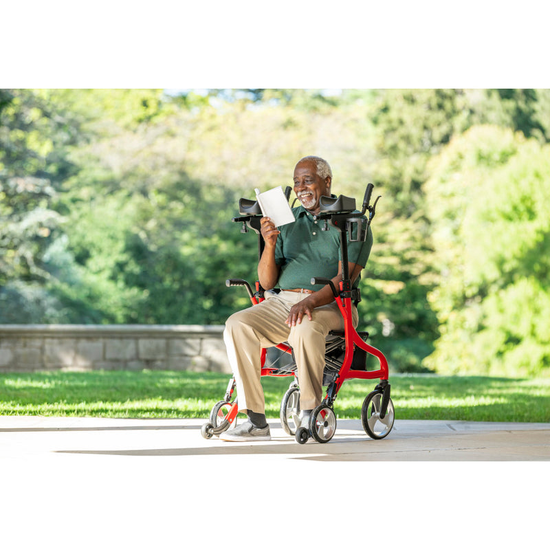 sitting down on the upright rollator by Drive