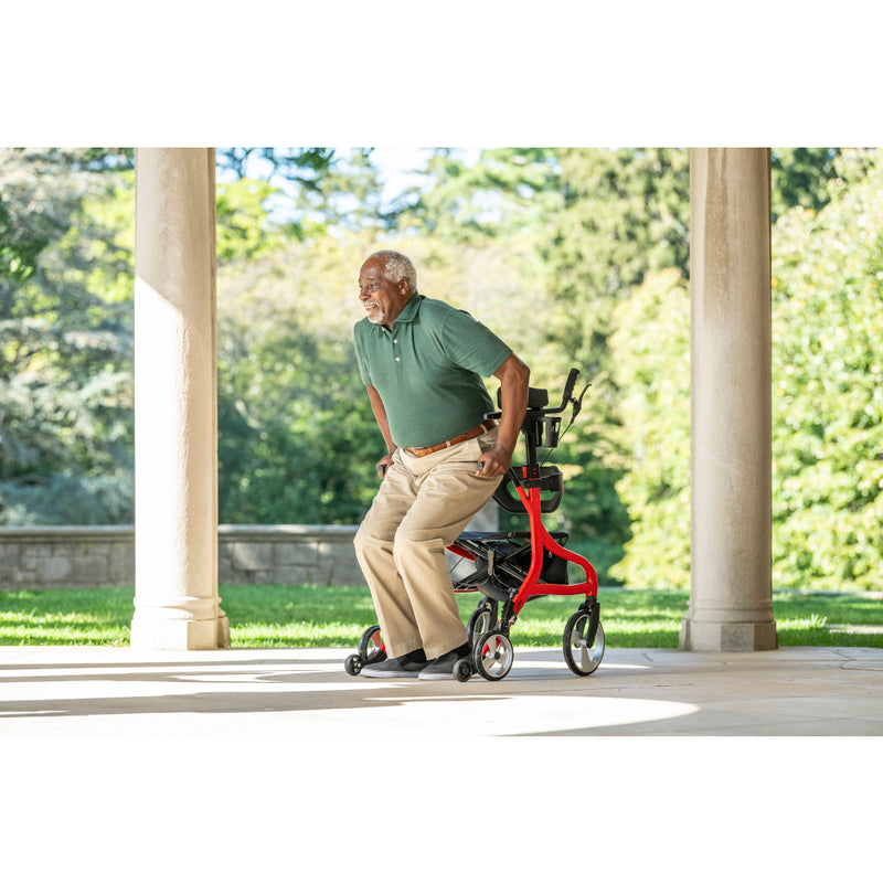 man standing up from the upright rollator by Drive
