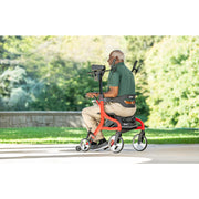 man sitting on the upright rollator by Drive