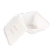 A white square plastic container with its lid leaning against it, shown on a plain white background.