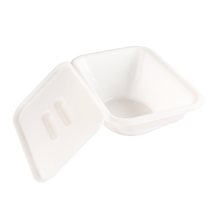 A white square plastic container with its lid leaning against it, shown on a plain white background.