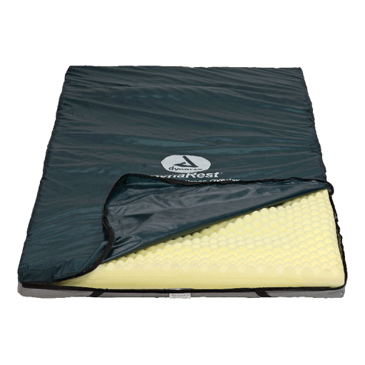 Sleeping pad with black cover and yellow foam on a white background