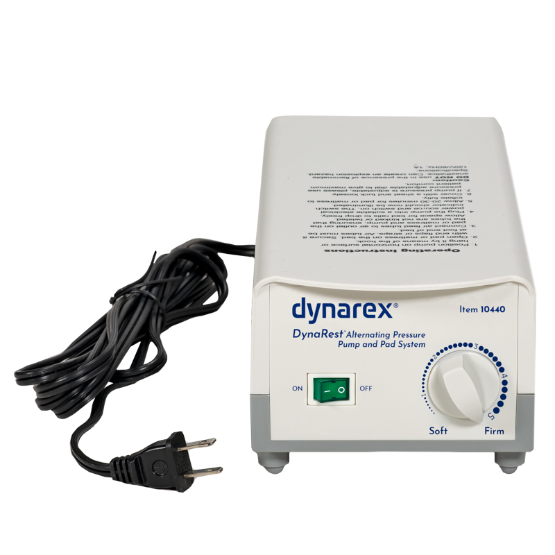 Dynarex DynaRest Alternating Pressure Pump and Pad System, item 10440, in a white rectangular unit with a black power cord, featuring a front dial and green power switch on a white background.