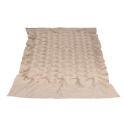 Beige textured air mattress on a white background