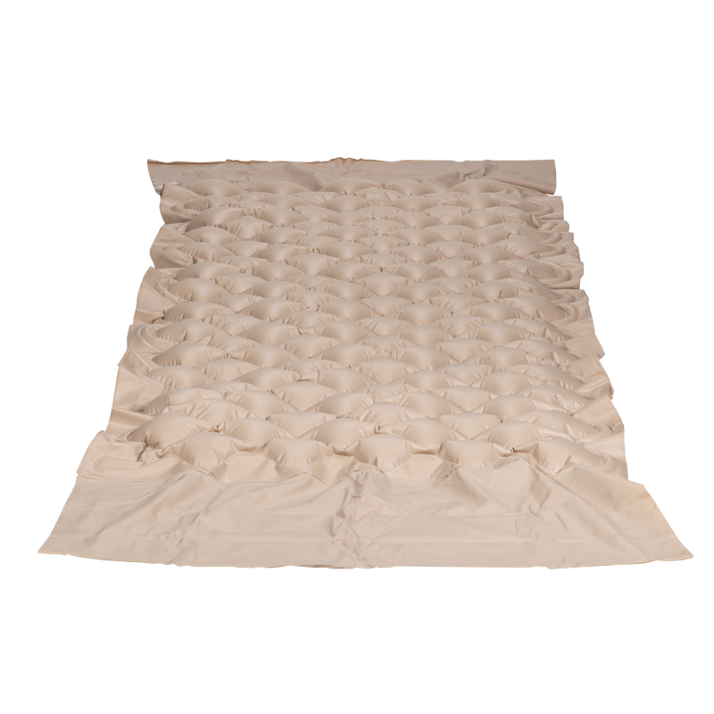 Beige textured air mattress on a white background