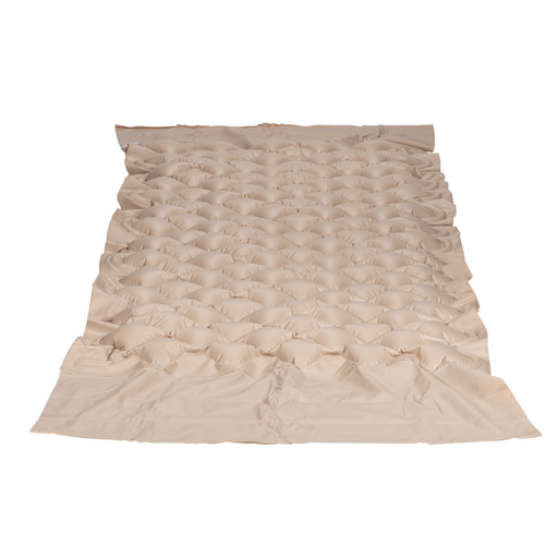 Beige textured air mattress on a white background