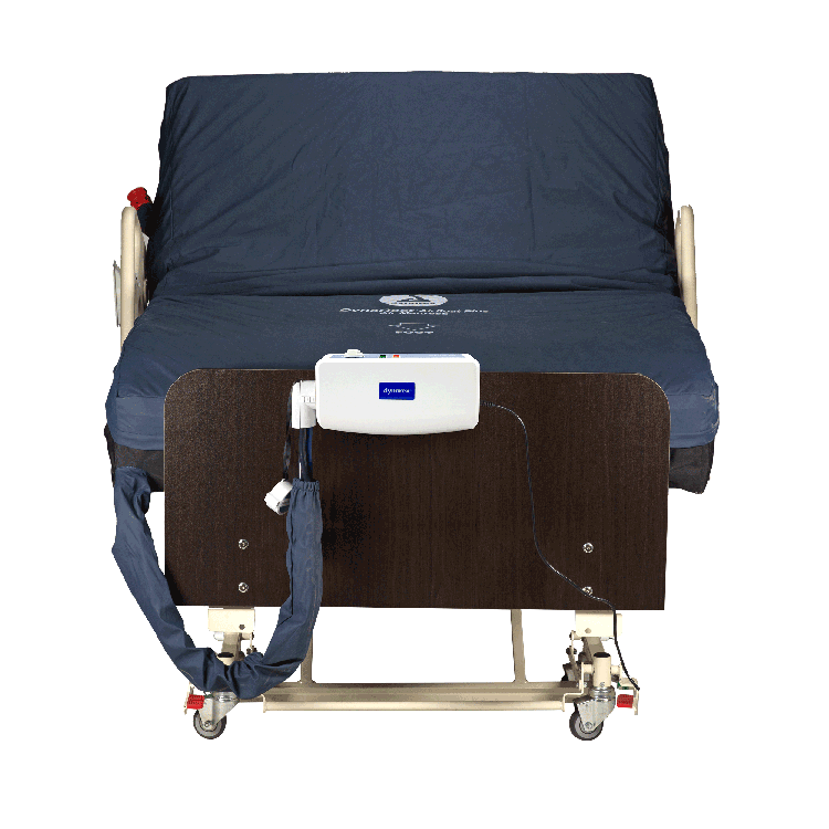 Medical bed with a control panel and straps on a white background