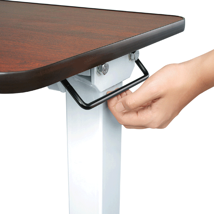 Hand adjusting a height-adjustable desk with a wooden top on a white background