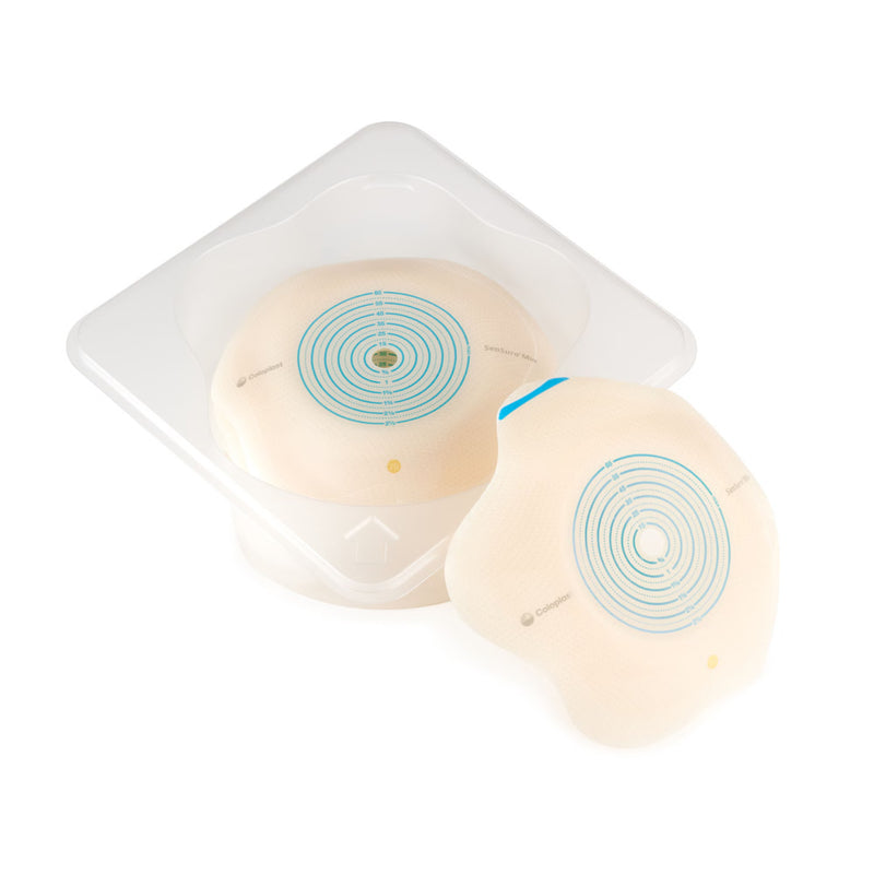 Two ostomy pouches in a clear plastic packaging on a white background