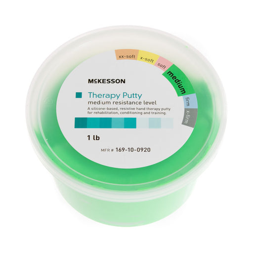 Green container of McKesson therapy putty on a white background