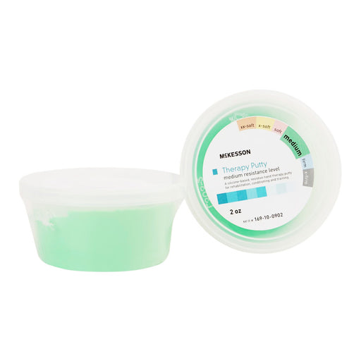 Two small round plastic tubs of Mskesson Therapy Puts on a plain white background, one filled with light mint green putty and the other showing the product label.
