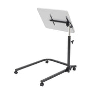 Adjustable standing desk with a white surface on a white background