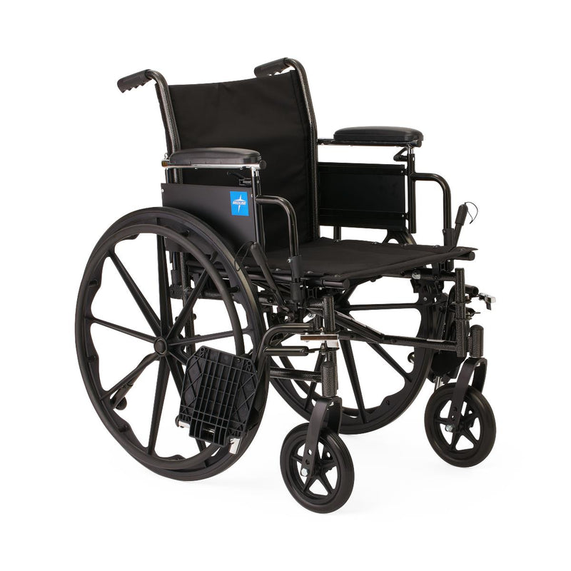 A black manual wheelchair with a black fabric seat and backrest, black metal frame, large spoked rear wheels, and smaller front cast wheels, photographed on a plain white background.
