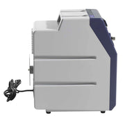 Side view of a gray and blue machine with a power cord on a white background