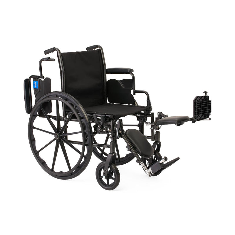 Black manual wheelchair with extended footrest on a white background