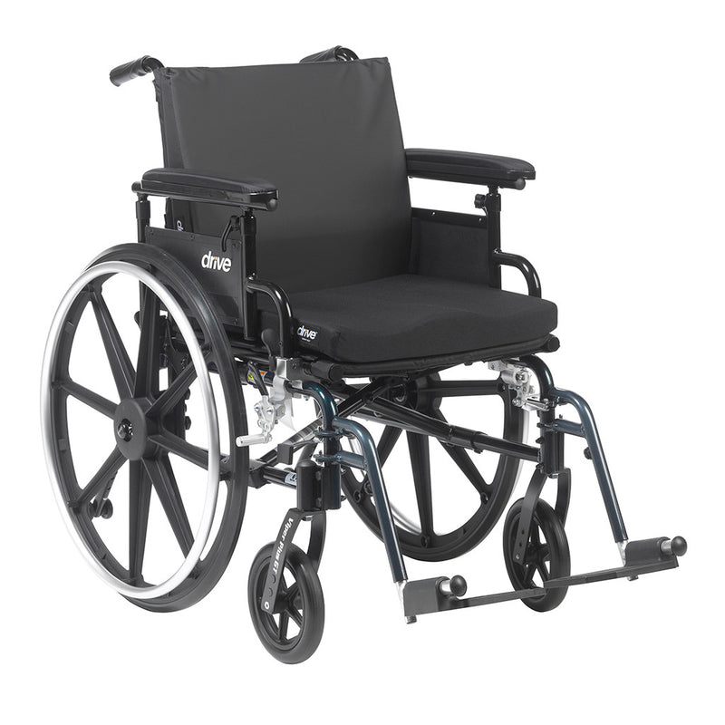 Black wheelchair with visible branding on a white background