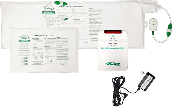 Caregiver alert monitor with sensor pad and power adapter on a white background