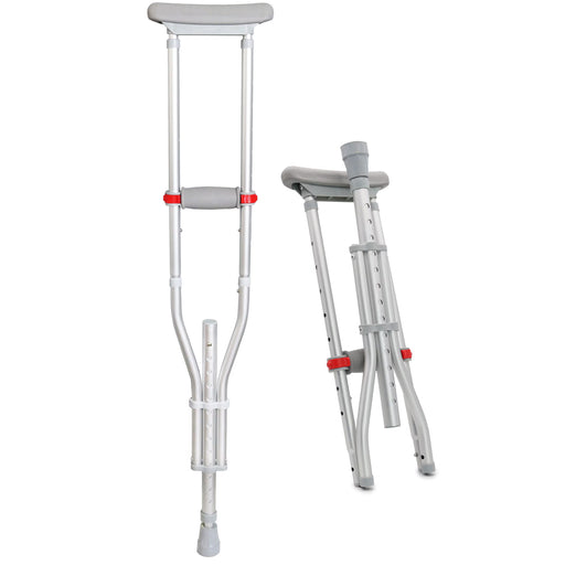 A pair of silver aluminum underarm crutches with gray padded cushions and red adjustment knobs, shown on a plain white background with one crutch standing open and the other folded.