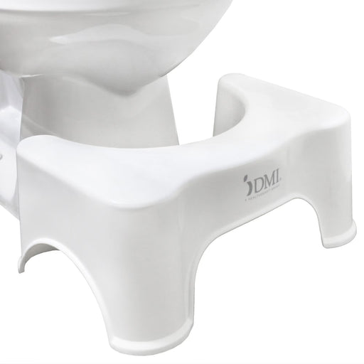 White plastic toilet training seat insert with a molded potty chair design, shown fitted under a white toilet. The brand name 'DMI' is printed on the side.
